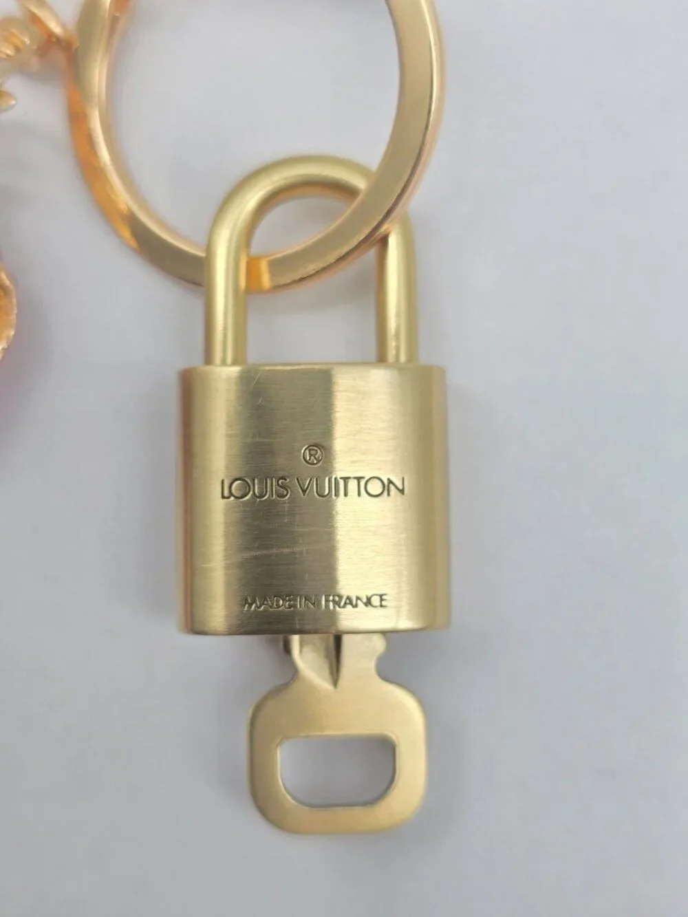 Authentic Louis Vuitton Gold Lock 🔒 Unbranded Dog Keychain Bag Charm LV